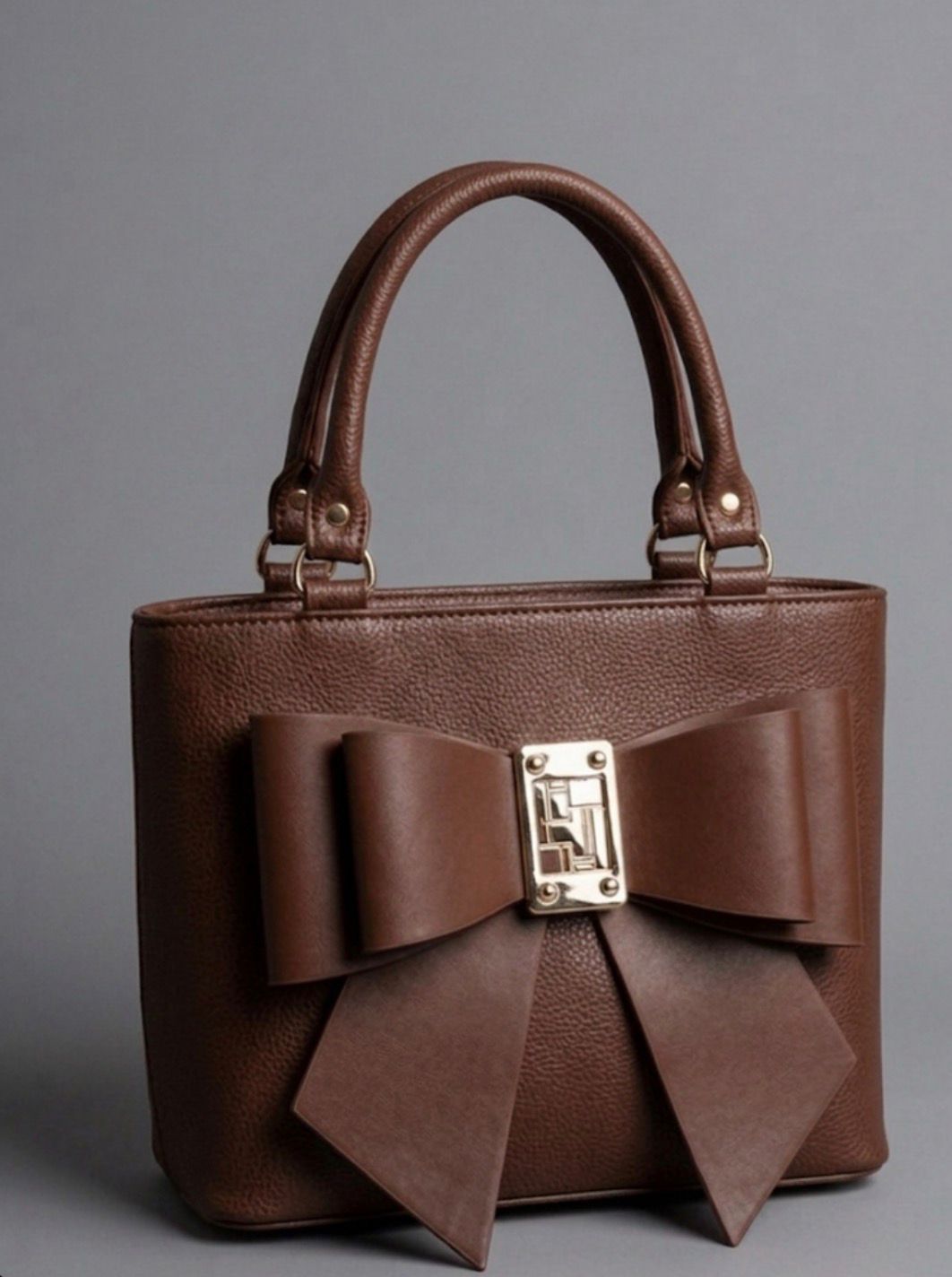 medium size bow style leather bag